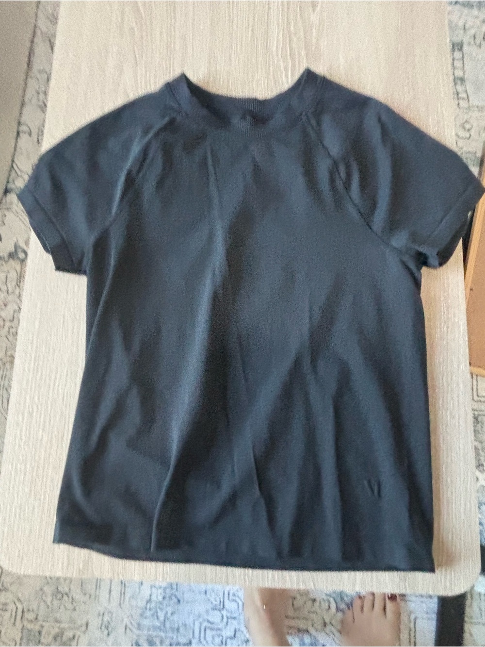 Vuori black athletic top